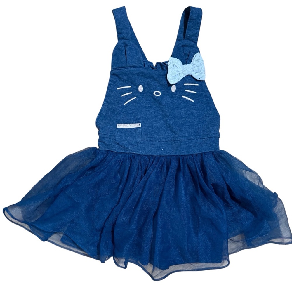 Adorable blue Hello Kitty romper with adjustable straps and white bow.